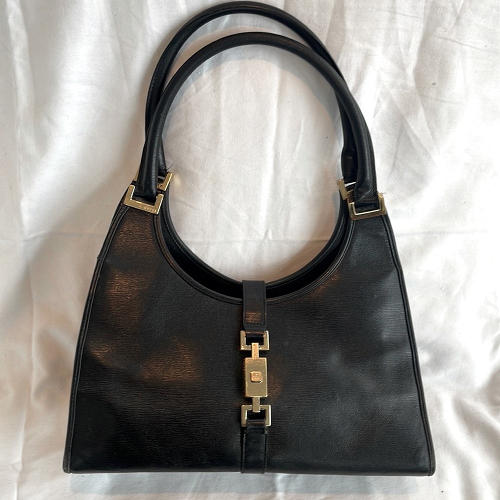 GUCCI Leather Jackie Bardot Bag. Black with gold hardware.